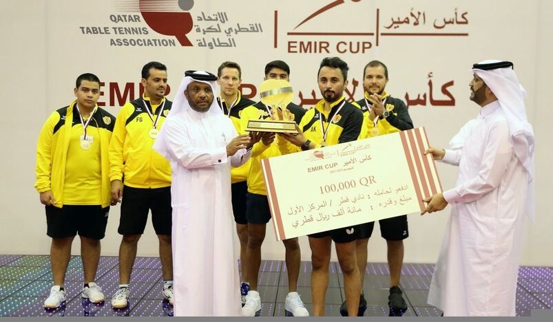 Team mates of Qatar Sports Club poses with the title